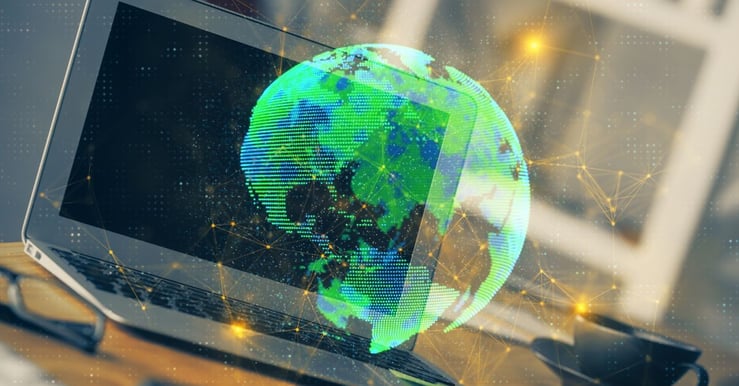 ERP digital transformation concept showing global data network overlay on laptop, representing cloud ERP systems, real-time reporting, and connected business operations