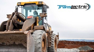 Front loader construction vehicle at a job site representing manufacturing and industrial operations, highlighting real-world use cases for ERP systems like SAP Business One